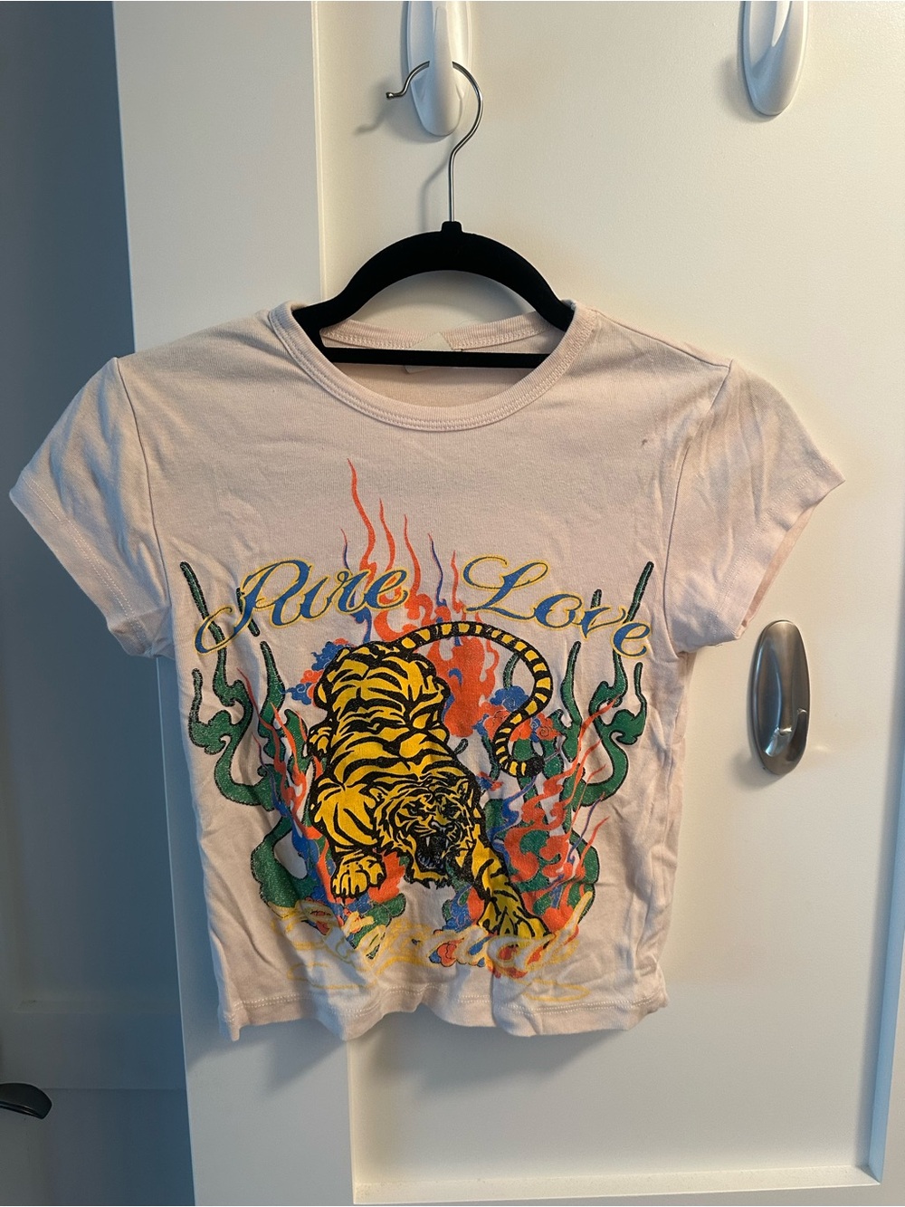 Urban Outfitters Light Pink Tee with Black Tag Detail